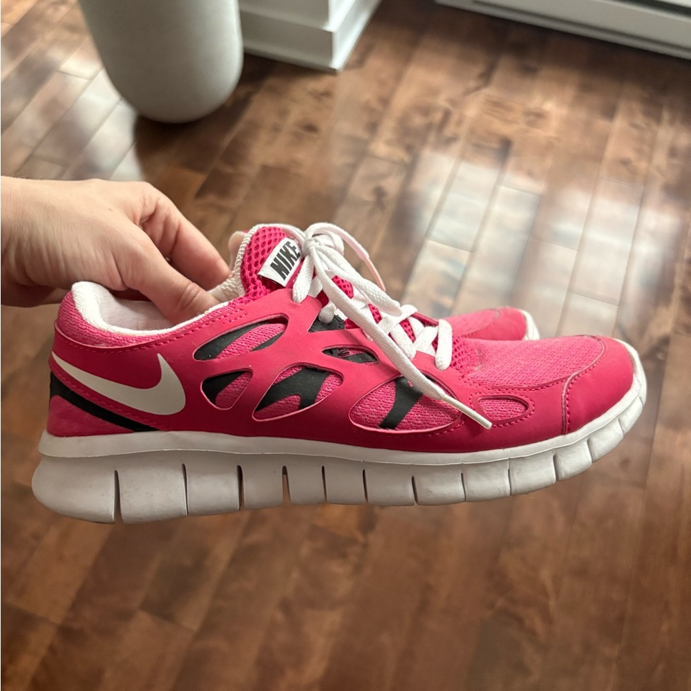 Nike Pink and White Sneakers with Classic Design